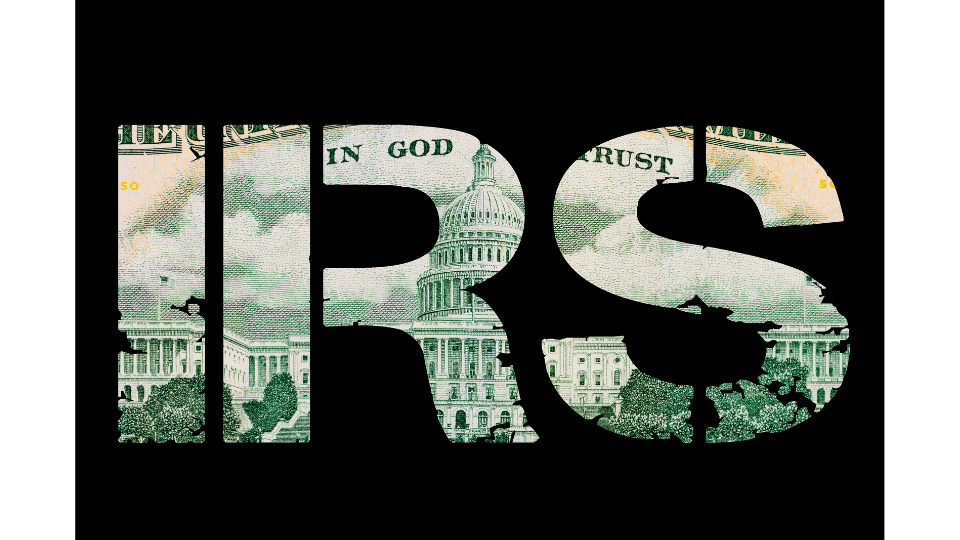 irs letters cutout with money on black